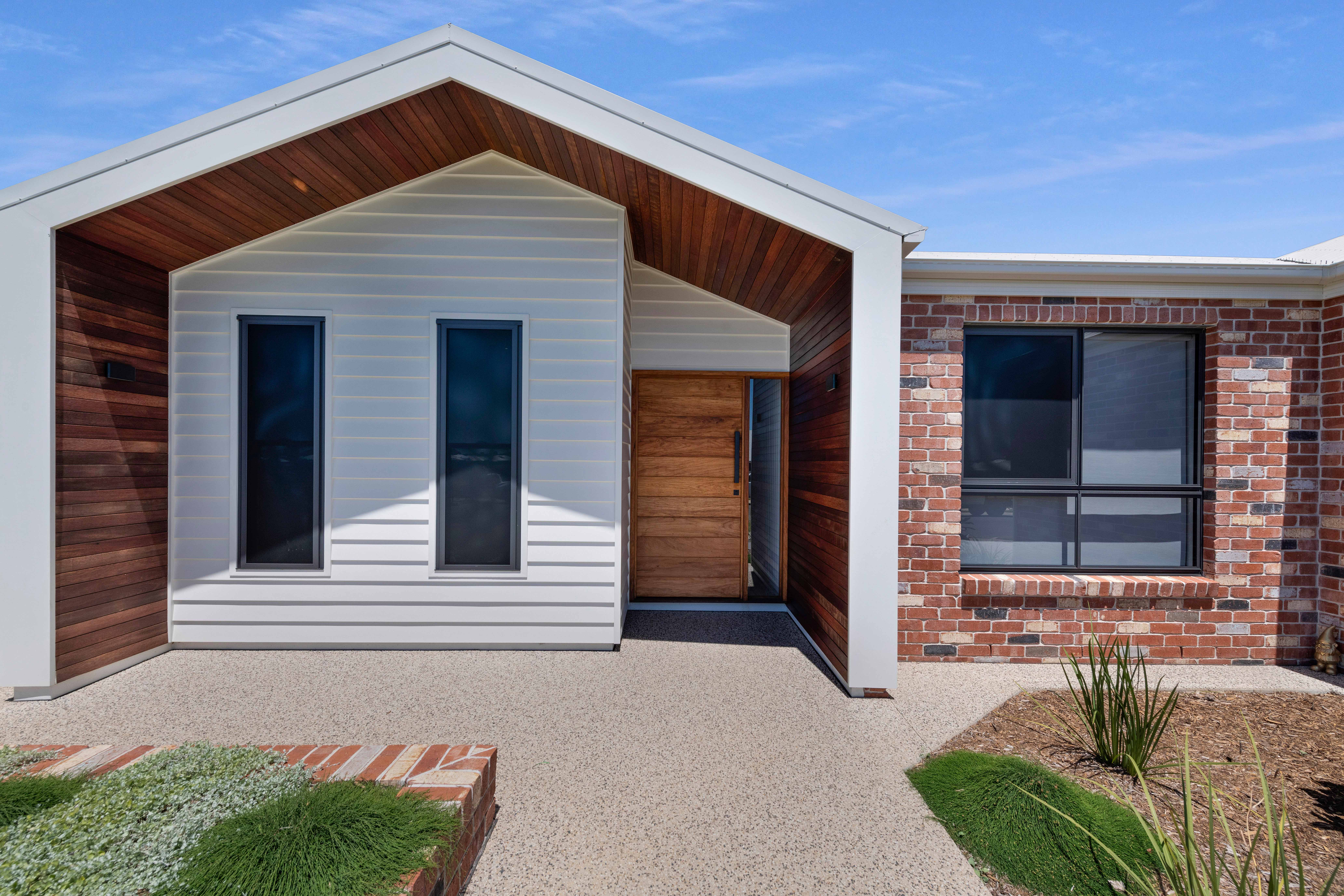 Australian made Solid timber joinery custom entrance door on house